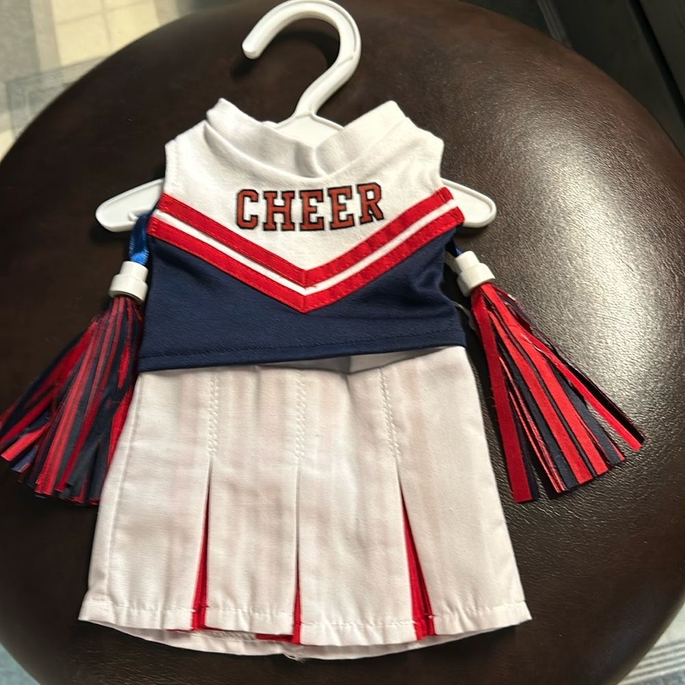Cheer leader top and skirt with Pom poms